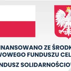Dofinansowano ze środków Państwowego Funduszu Celowego - fundusz solidarnościowy. Widoczne flagi Polski i godło.